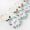 Wine glass charms Christmas wreath personalized closeup